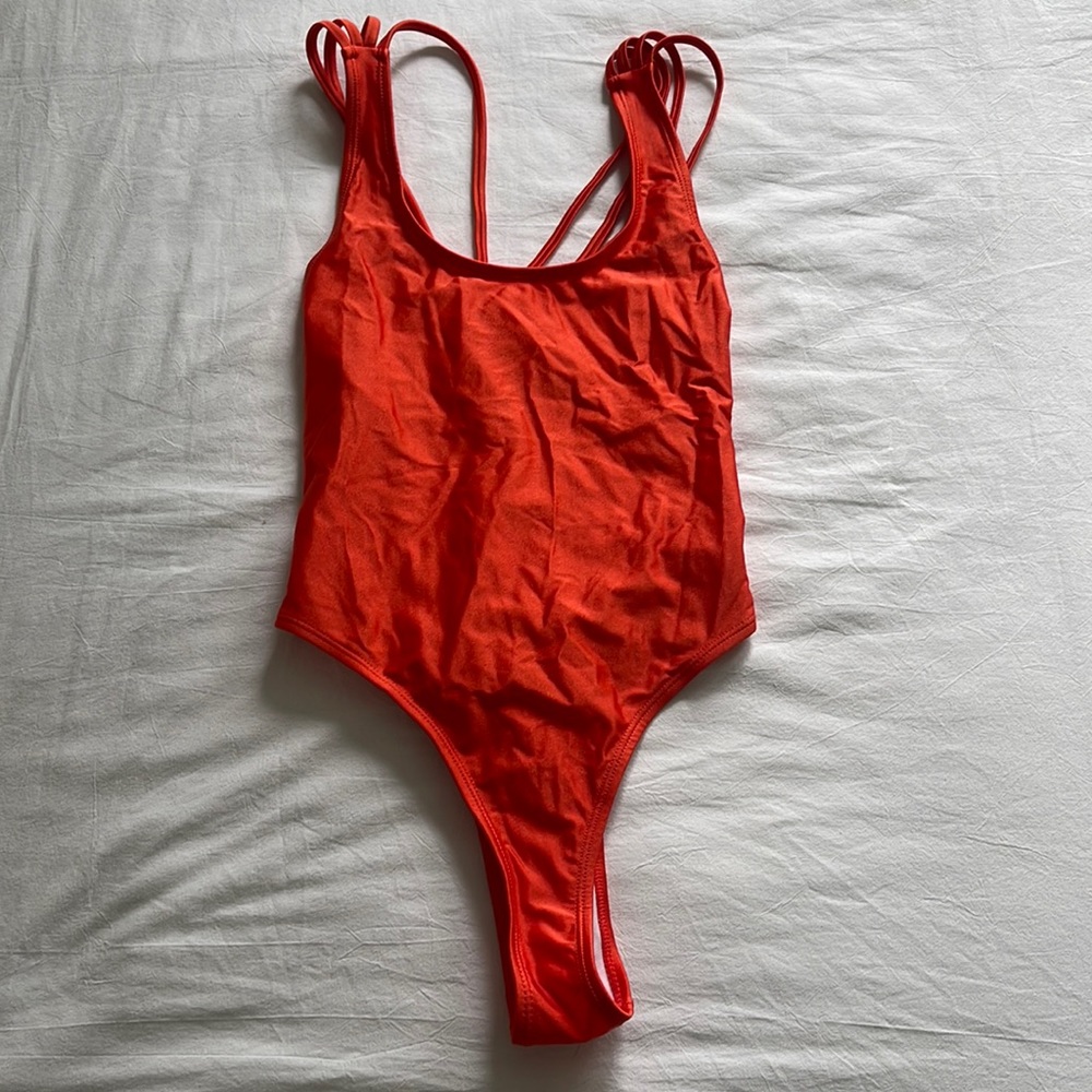 Glamorous bright orange one piece bathing suit